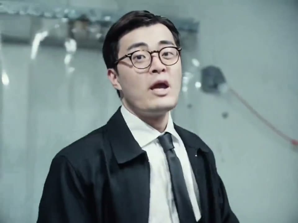 A friend in glasses, a black jacket and a tie takes the freezer from the wall to the shelves. Made with AI by the friend and shown with permission.